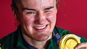 Harrington poses with her gold medal