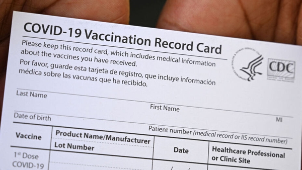 A Covid-19 vaccination record card issued in Los Angeles