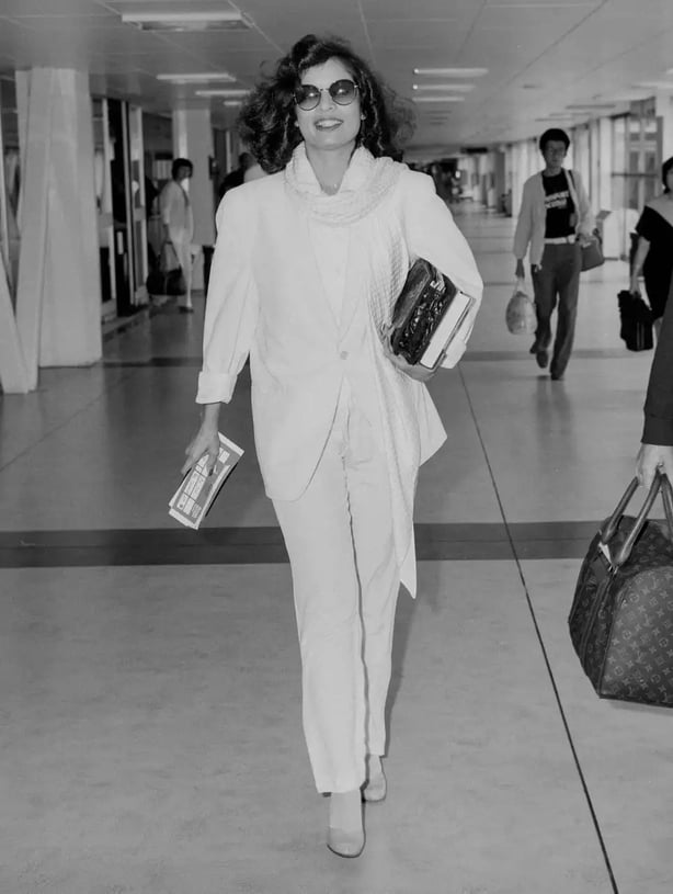 Style icons like Bianca Jagger helped make trousers more mainstream in the 1970s (Alamy/PA)
