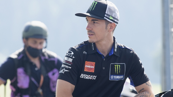 Maverick Vinales looks on by the service road during free practice 1 in Austria