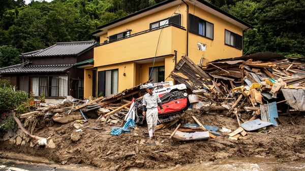 Houses damaged by a landslide triggered by heavy rain in Kanzaki, Saga prefecture