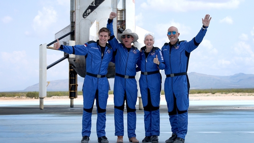 Blue Origin's New Shepard crew, Oliver Daemen, Jeff Bezos, Wally Funk, and Mark Bezos, after flying into space in the Blue Origin New Shepard on July 20, 2021