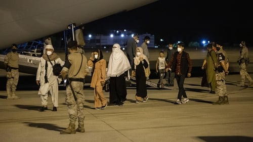 People arrive in Madrid after a repatriation flight from Kabul