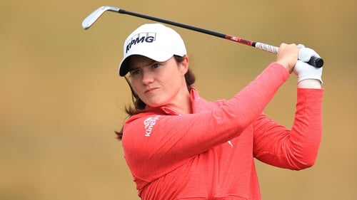 Leona Maguire playing her second shot on the first hole