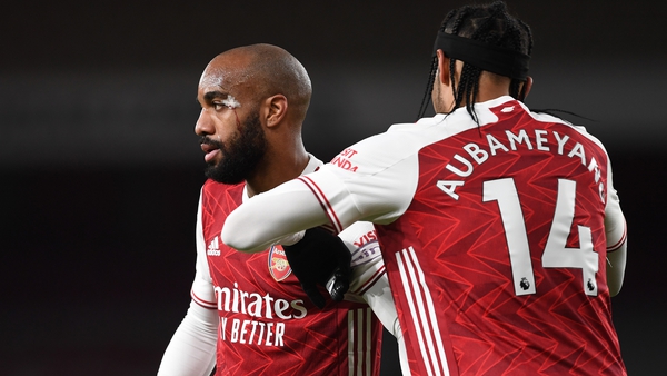 Aubameyang has been cleared to return but Lacazette (l) will miss the game against Chelsea