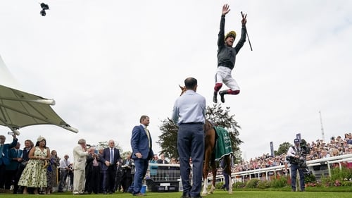 Frankie Dettori leaps from Stradivarius after winning The Weatherbys Hamilton Lonsdale Cup Stakes