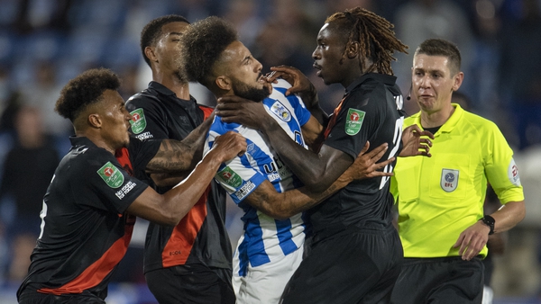 Everton's Moise Kean was sent off after grabbing Sorba Thomas of Huddersfield Town