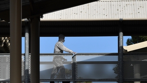 A worker deep cleans a school in Sydney