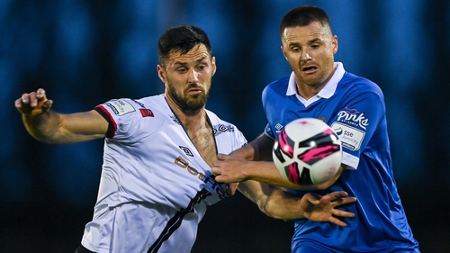 Dundalk's Patrick Hoban and Eddie Nolan of Waterford FC battle for possession