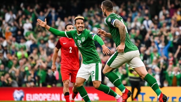 Republic of Ireland defender Shane Duffy celebrates with Callum Robinson