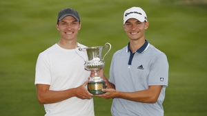 Nicolai Hojgaard poses with his brother Rasmus after winning the Italian Open