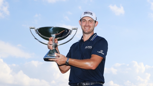 Patrick Cantlay with the FedEx Cup trophy and $15m in his pocket