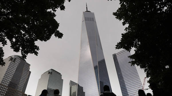 One World Trade Center towers over the September 11 Memorial and Museum in New York