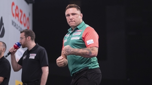 Gerwyn Price and Wales team-mate Jonny Clayton moved through to a second-round tie with Lithuania on Saturday