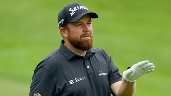 Shane Lowry reacts after his second shot on the fourth hole