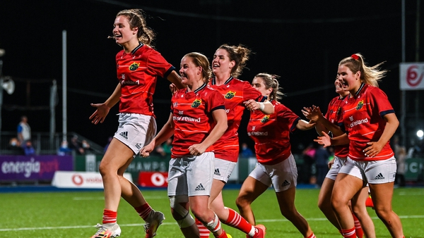 Munster players including Alana McInerney and Nicole Cronin celebrate after the match