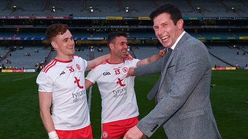 Seán Cavanagh congratulates Tyrone players Conor Meyler, left, and Darren McCurry after the county's latest All-Ireland triumph
