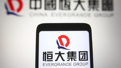 Evergrande Dodges Default Again But Concerns Remain