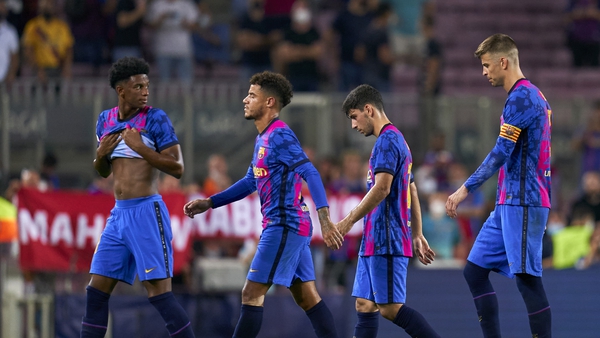 Barcelona players dejected after they losing to the German champions
