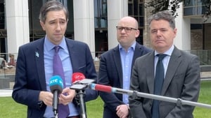 Minister Simon Harris (L) said Matt Carthy had made comments in the Dáil yesterday that would be defamatory if they had been said elsewhere