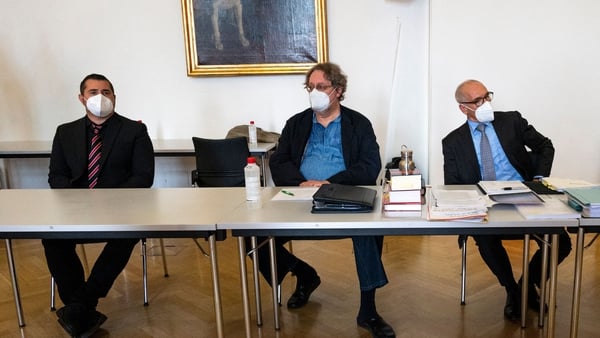 Lawyers Alexander Klauser (R), Peter Kolba (C) and their client Ulrich Schopf (L)