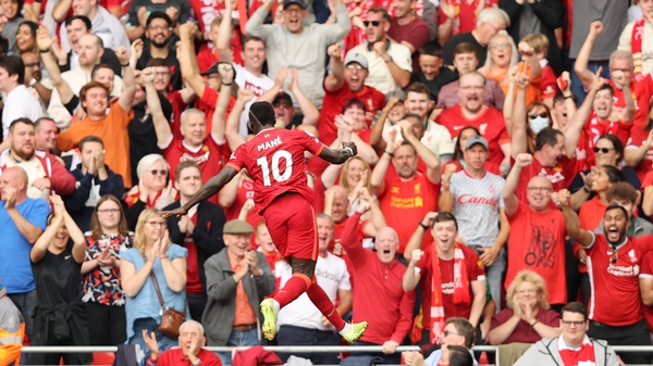 Sadio Mane celebrates his 100th goal for Liverpool