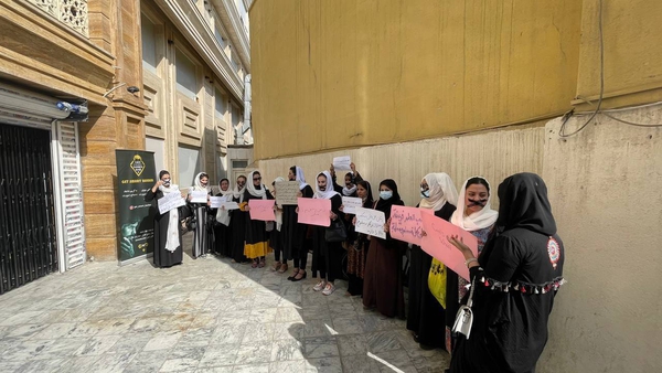 Afghan women staged a 'silent protest opposite the Ministry of Education in Kabul