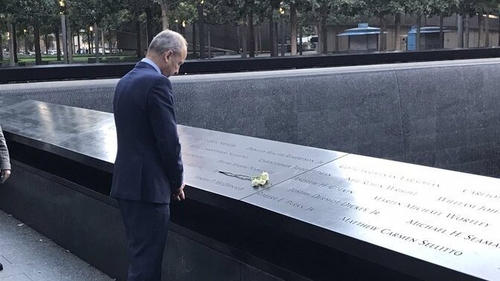 The Taoiseach laid a white rose at each of the names of the six Irish-born victims