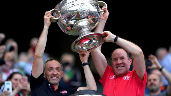 Brian Dooher (L) and Feargal Logan lift the Sam Maguire Cup after Tyrone beat Mayo
