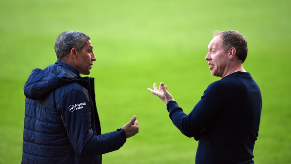 Steve Cooper (R) and Chris Hughton pictured when Swansea played Forest in January