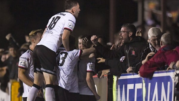 Dundalk players and supporters celebrate after their third goal, scored by Michael Duffy, during the extra.ie FAI Cup Quarter-Final Replay match between Dundalk and Finn Harps at Oriel Park