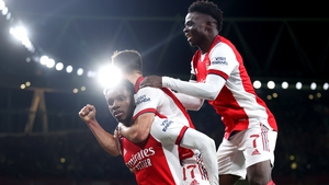 Eddie Nketiah celebrates with Arsenal team-mates Cedric Soares and Bukayo Saka