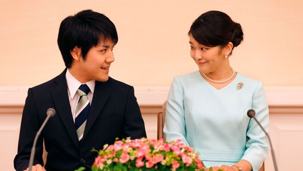 Princess Mako and Kei Komuro smile during a press conference to announce their engagement in September 2017