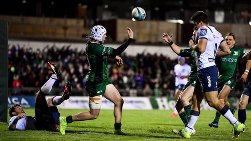 Connacht's Mack Hansen (white scrumcap) celebrates his first try for the province