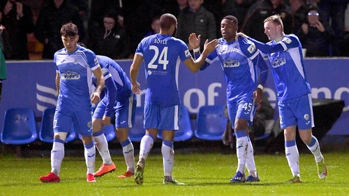 Tunde Owolabi celebrates scoring his second goal of the night with his Finn Harps team-mates