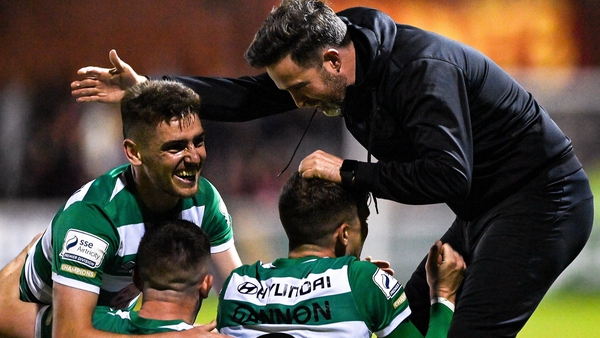 Stephen Bradley (R) celebrates with his players