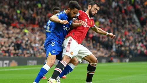 Bruno Fernandes battling for possession with Andros Townsend at Old Trafford