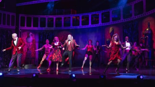 Kristian Lavercombe (centre) leads the charge as the Rocky Horror crew do the Time Warp