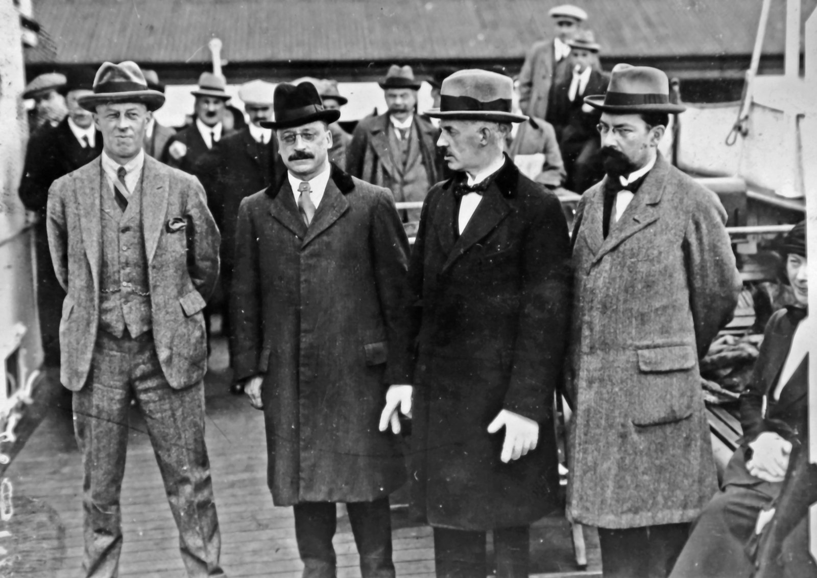 Image - Four of the delegates before setting off from Kingstown/Dún Laoghaire: Bardon, Griffith, Duggan and Duffy. Collins took great care NOT to be included in these group photographs, to the puzzlement of the Press. (Credit: Getty Images)