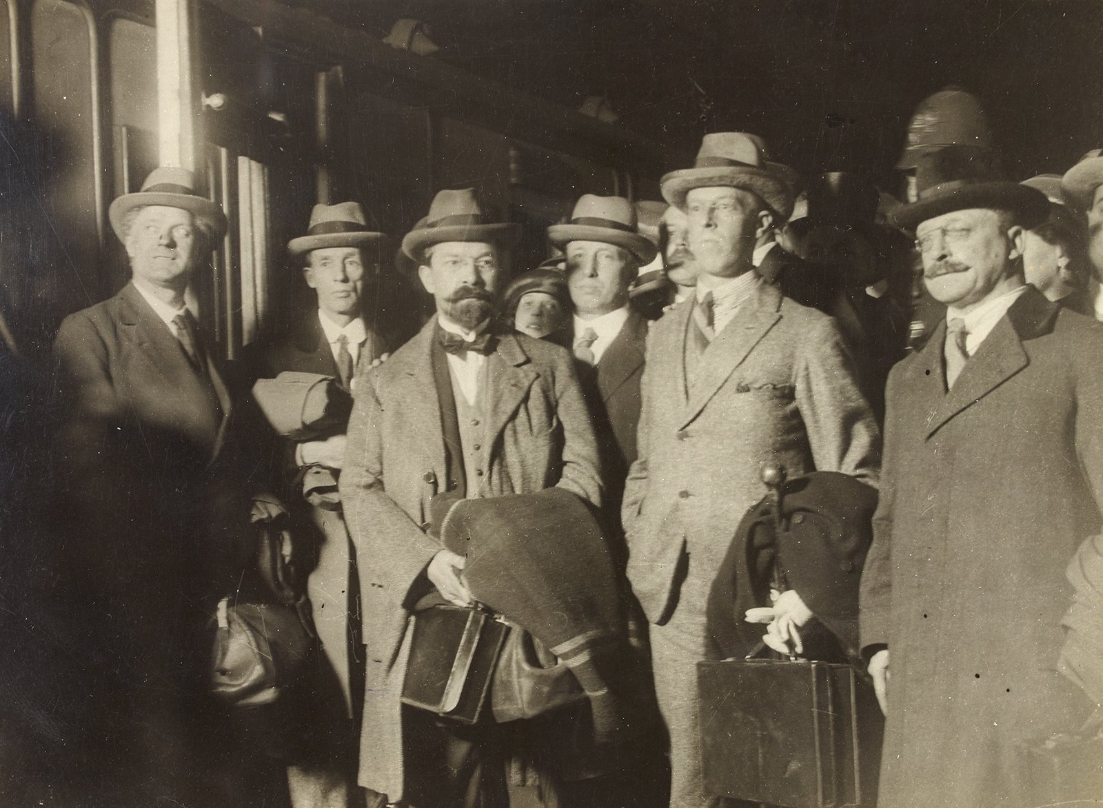 Image - INTO THE STORM: Negotiators George Gavan Duffy, Robert Barton and Arthur Griffith, with chief secretary Erskine Childers returning to Dublin after the signing (Credit: National Library of Ireland)