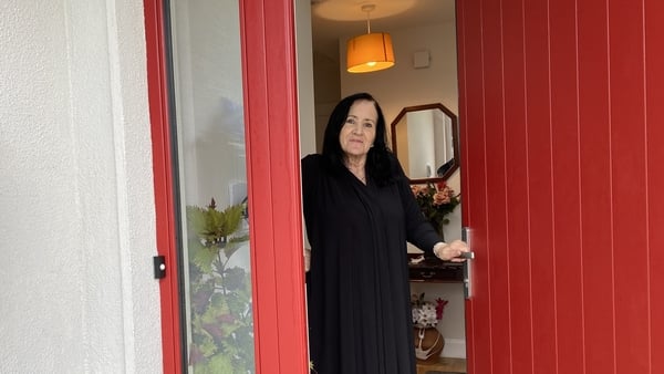 Jean Cosgrove at the front door of her new home in Claregalway