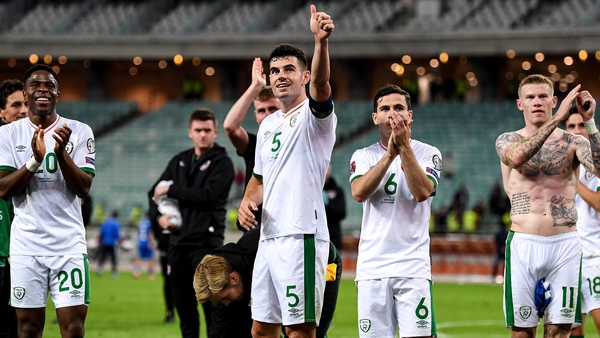 Ireland players salute the fans after the win in Baku