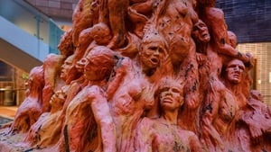 The statue features 50 anguished faces and tortured bodies piled on one another