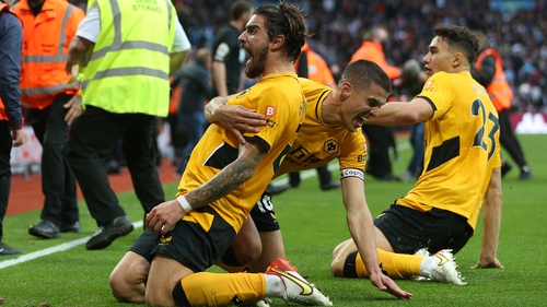 Ruben Neves' deflected free kick sealed a stunning comeback for Wolves