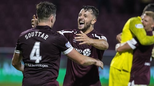 Craig Halkett made the most of his late sortie forward for a Hearts corner