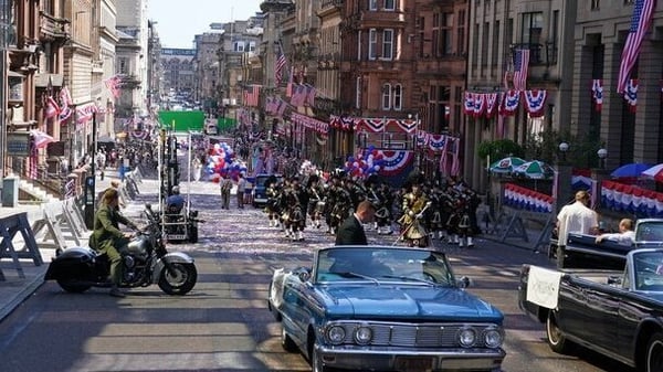 A parade scene on St Vincent Street in Glasgow city centre during filming for the new Indiana Jones 5 movie starring Harrison Ford (Andrew Milligan/PA)