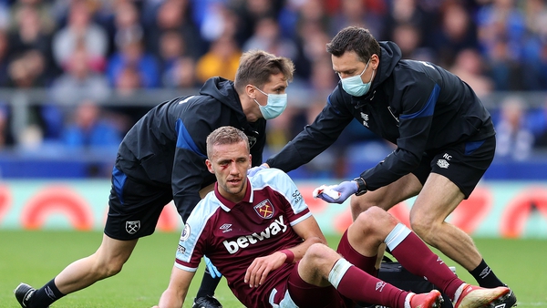 Soucek receives medical treatment on the Goodison Park pitch