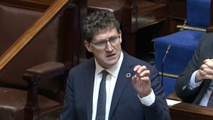 Eamon Ryan denied that officials for the department strenuously fought against costs being awarded to families