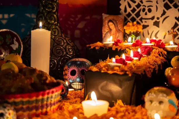 A traditional Day of the Dead altar (Alamy/PA)