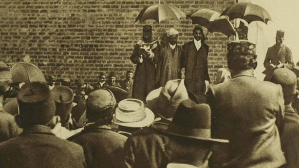 Mohandas Gandhi, on the right of the group facing the camera, addressing a crowd. The caption on this picture referred to Gandhi as the 'Mahatma' of Indian unrest Photo: Illustrated London News, 17 September 1921
